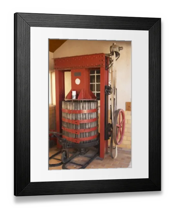 Framed Print : A wine press that is also some100 years old. It produces a pressure of 170 bar Framed Print : A wine press that is also some100 years old. It produces a pressure of 170 bar