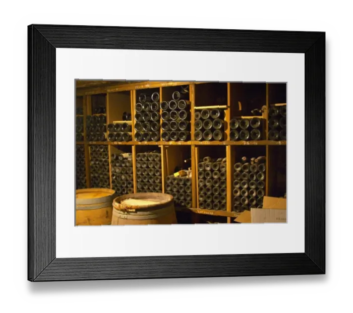 Framed Print : Older vintages of wine aging in the cellar. Alain Voge, Cornas, Ardeche, Ardeche