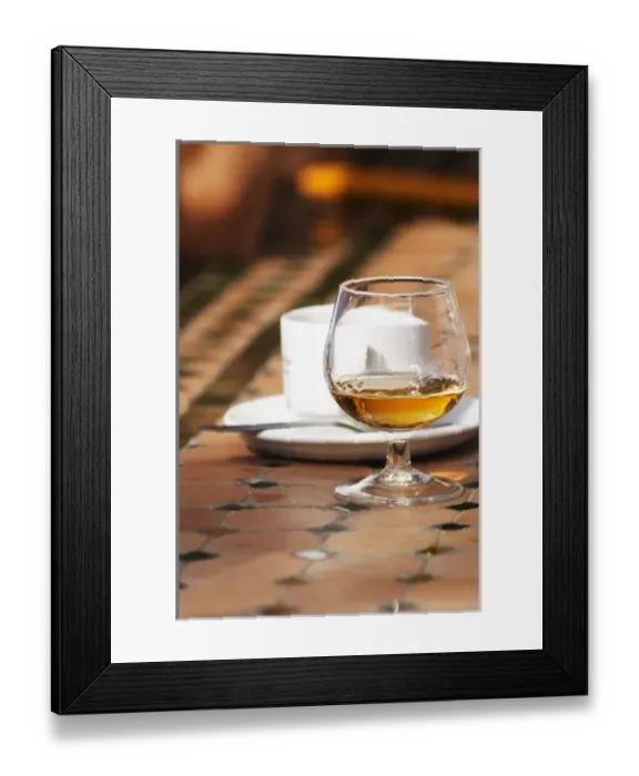 Framed Print : Coffee and a snifter glass with golden Vieux Marc de Chateauneuf, made from chateaunef