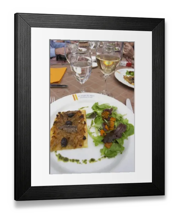 Framed Print : A tarte fine d oignon - onion tart with salad and a glass of water and white chateauneuf Framed Print : A tarte fine d oignon - onion tart with salad and a glass of water and white chateauneuf
