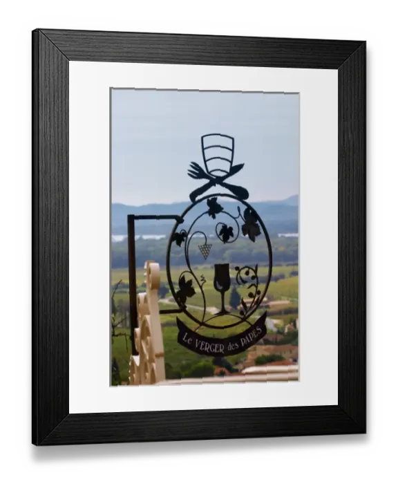 Framed Print : The restaurant Le Verger de Papes in the village just at the foot of the ruined Pope s