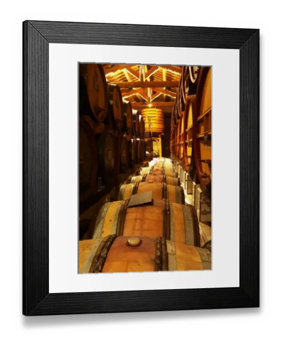 Framed Print : The aging cellar with oak barrels and larger wooden vats. Chateau de Beaucastel, Domaines Perrin