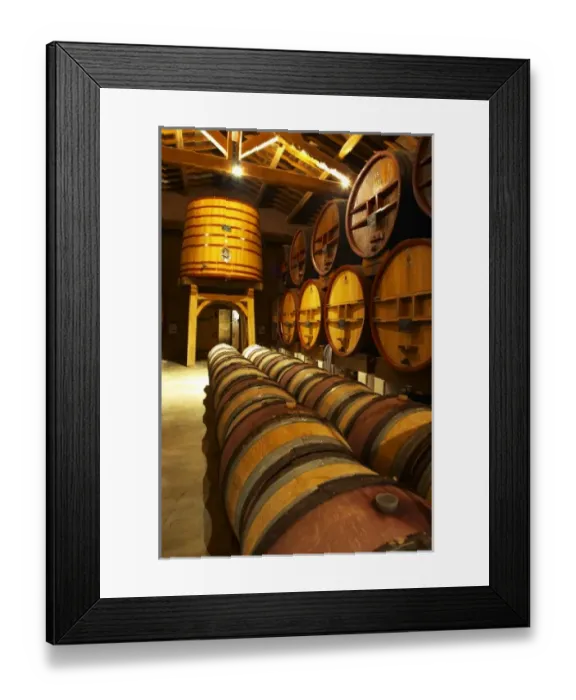 Framed Print : The aging cellar with oak barrels and larger wooden vats. Chateau de Beaucastel, Domaines Perrin Framed Print : The aging cellar with oak barrels and larger wooden vats. Chateau de Beaucastel, Domaines Perrin