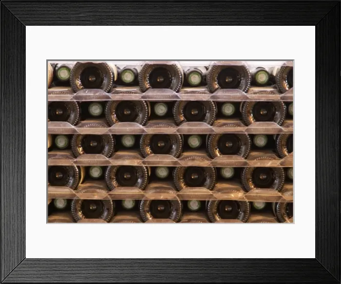 Framed Print : A pile of bottles stacked high with the bottle bottoms and bottle necks. Tax stamp Framed Print : A pile of bottles stacked high with the bottle bottoms and bottle necks. Tax stamp