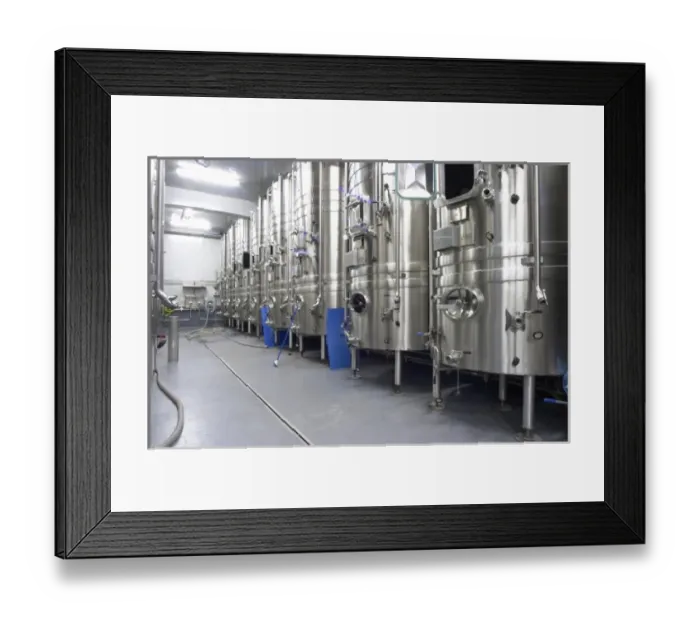 Framed Print : Mas La Chevaliere. near Beziers. Languedoc. Stainless steel fermentation and storage tanks