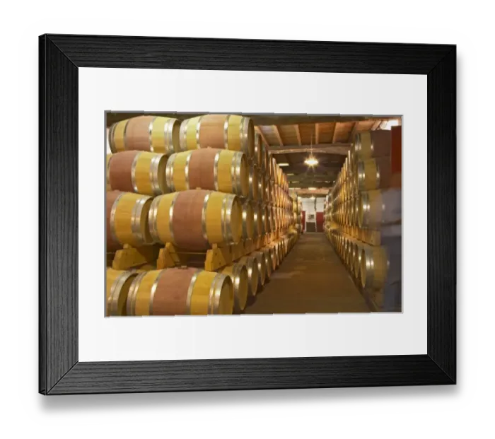 Framed Print : The old cellar for ageing wines in barrel with rows and rows of oak barriques Chateau Framed Print : The old cellar for ageing wines in barrel with rows and rows of oak barriques Chateau