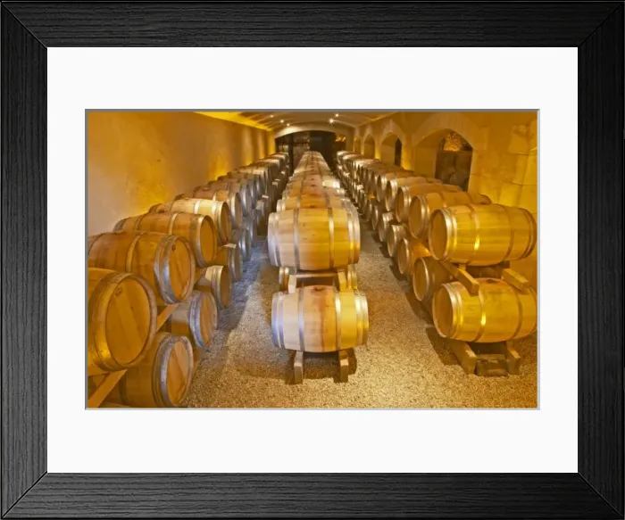 Framed Print : The barrel ageing cellar with rows and stacks of oak barriques Chateau Thieuley La Framed Print : The barrel ageing cellar with rows and stacks of oak barriques Chateau Thieuley La