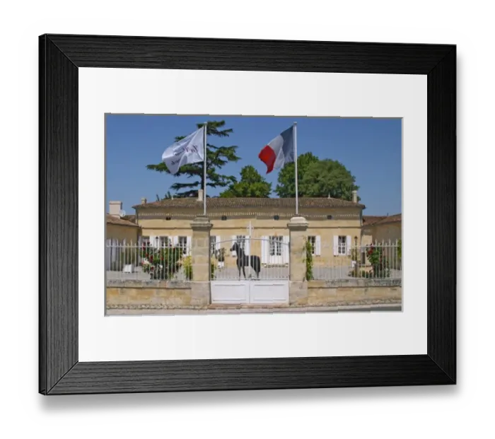 Framed Print : Chateau La Couspaude, the main building, with a white iron fence a French flag Framed Print : Chateau La Couspaude, the main building, with a white iron fence a French flag