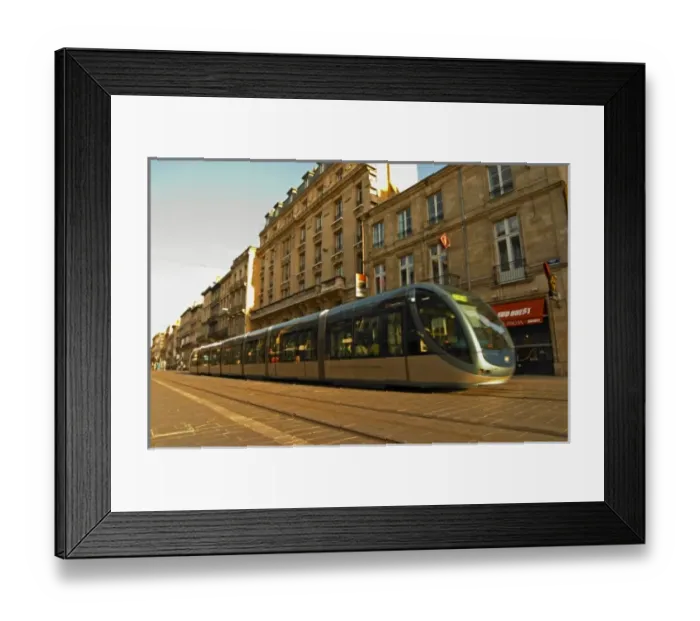 Framed Print : The new modern tram on the posh shopping street Cours de l Intendence in Bordeaux Framed Print : The new modern tram on the posh shopping street Cours de l Intendence in Bordeaux