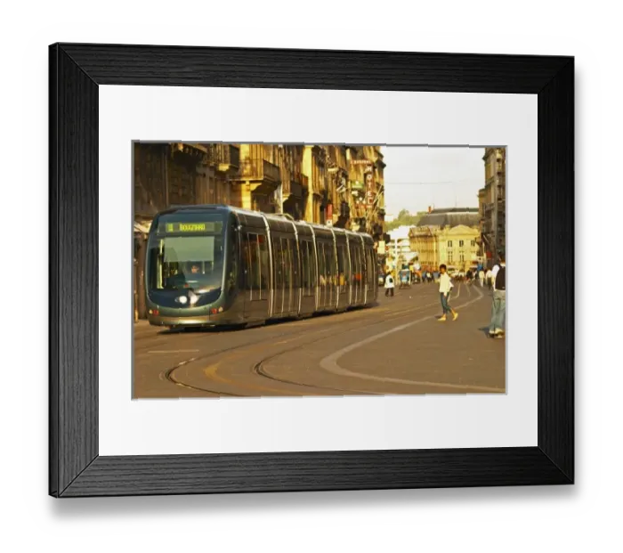 Framed Print : The new modern tram on the posh shopping street Cours de l Intendence in Bordeaux