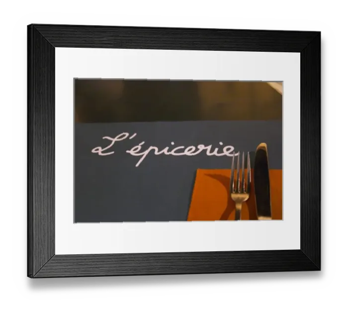 Framed Print : The restaurant l Epicerie in Avignon. Detail of table mat and knife fork and napkin