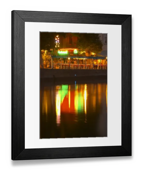 Framed Print : Restaurants along the l Herault river. L Herault river. Agde town. Languedoc