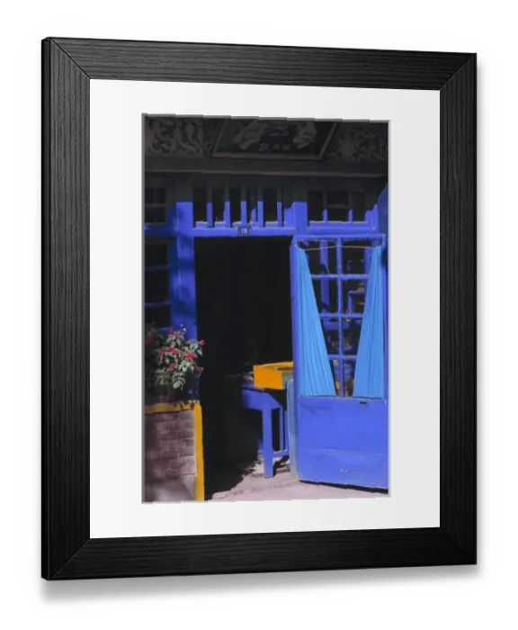 Framed Print : China, Xinjiang, Kashgar. Behind an open, periwinkle blue-painted door with blue curtains Framed Print : China, Xinjiang, Kashgar. Behind an open, periwinkle blue-painted door with blue curtains