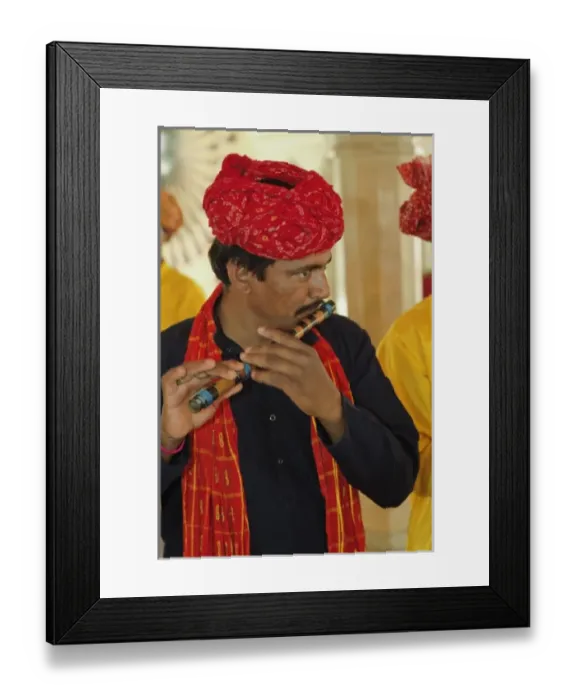 Framed Print : Musician playing flute inside Amber Fort, Jaipur, India Framed Print : Musician playing flute inside Amber Fort, Jaipur, India