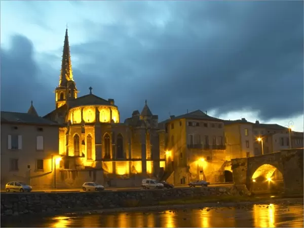 The gothic St Martin Church and the bridge across the l Aude river. Town of Limoux