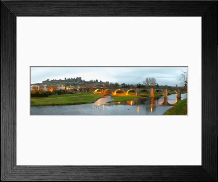 Framed Print : Carcassonne. Languedoc. The old bridge across the Aude river. Illuminated in early morning