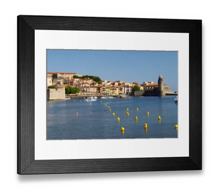 Framed Print : The church Eglise Notre Dame des Anges, our lady of the angels. With its emblematic church tower