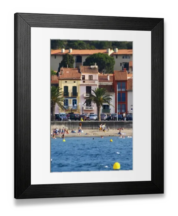 Framed Print : The beach in the village. Colourful houses along the water. Collioure. Roussillon Framed Print : The beach in the village. Colourful houses along the water. Collioure. Roussillon