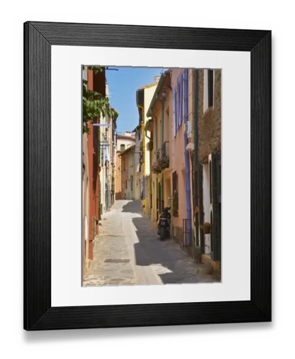 Framed Print : A narrow street in the old town. Collioure. Roussillon. France. Europe. Colourful houses