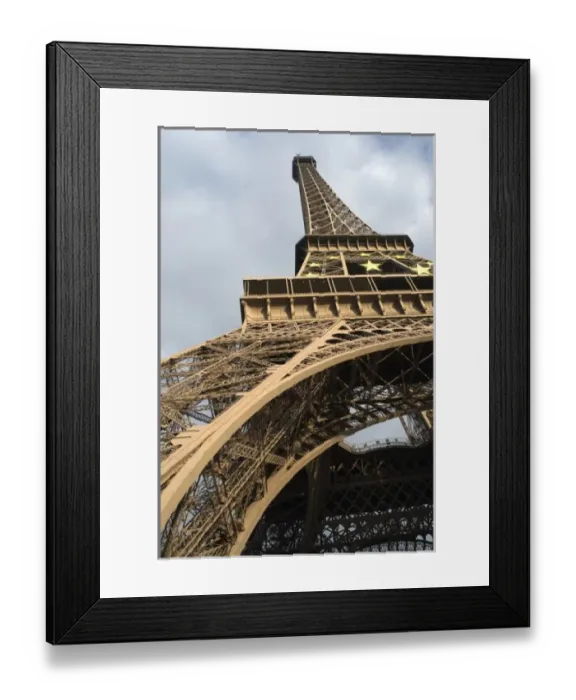 Framed Print : Unknown. The steel structure of the Eiffel Tower, Paris, France, viewed from a low angle Framed Print : Unknown. The steel structure of the Eiffel Tower, Paris, France, viewed from a low angle