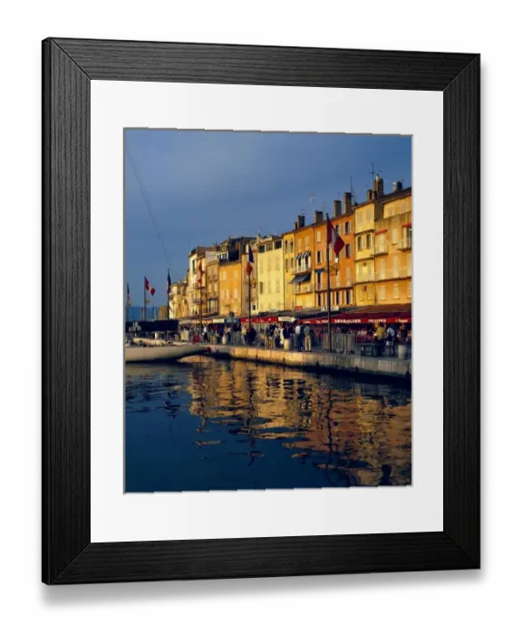 Framed Print : Europe, France, St. Tropez. The cafes along the harbor are filled with people-watchers in St Framed Print : Europe, France, St. Tropez. The cafes along the harbor are filled with people-watchers in St