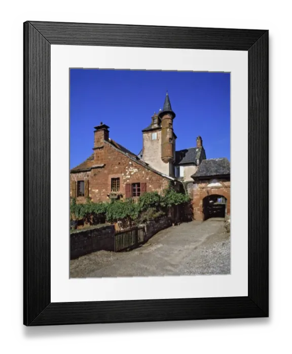 Framed Print : Europe, France, Collognes-la-Rouge. Red sandstone buildings and turrets abound in Framed Print : Europe, France, Collognes-la-Rouge. Red sandstone buildings and turrets abound in