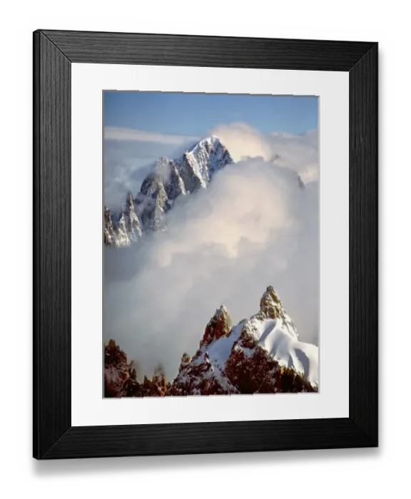 Framed Print : Europe, France, Chamonix. The jagged spires of Aiguilles du Midi capture the clouds Framed Print : Europe, France, Chamonix. The jagged spires of Aiguilles du Midi capture the clouds