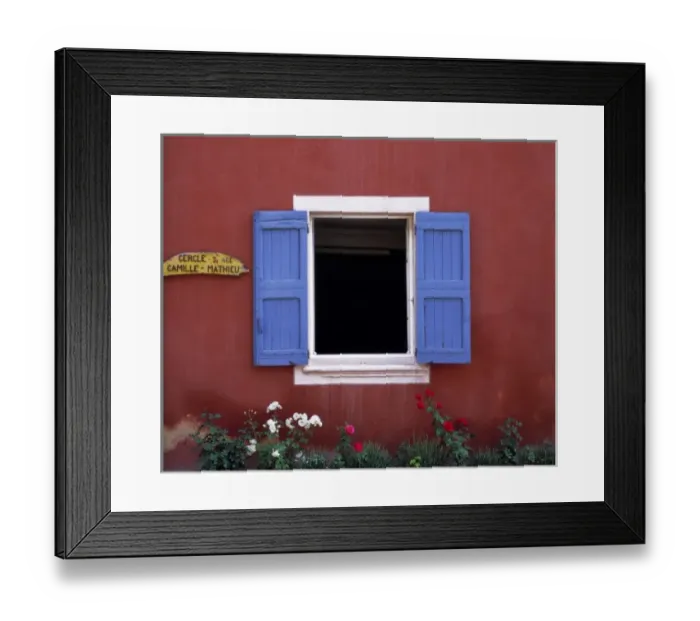 Framed Print : Europe, France, Roussillon. Blue shutters frame an open window in the colorful village