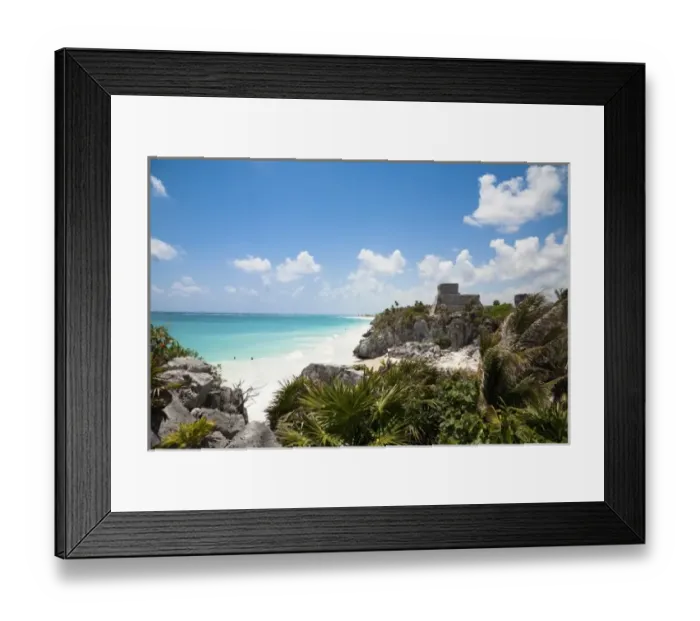 Framed Print : Cancun, Quintana Roo, Mexico - A white sand beach behind tropical foliage. An old Framed Print : Cancun, Quintana Roo, Mexico - A white sand beach behind tropical foliage. An old