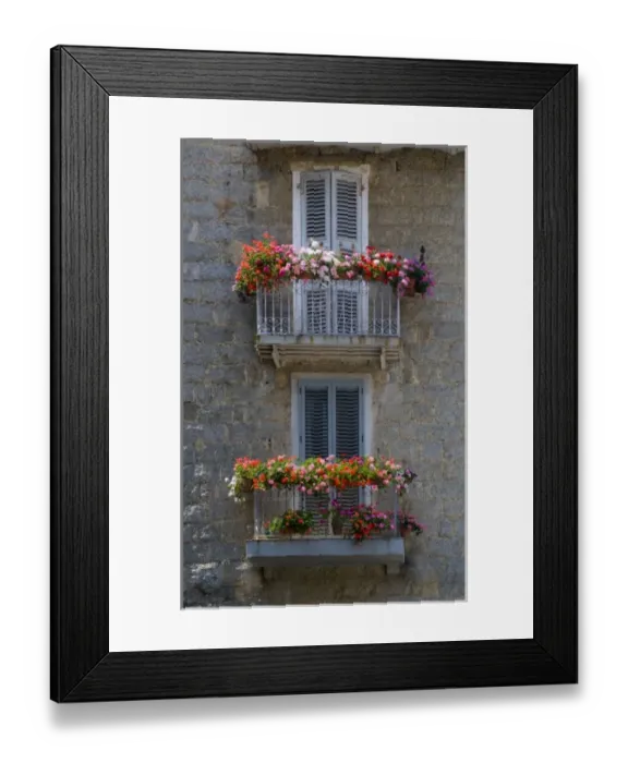 Framed Print : France, Corsica. Flower boxes on window balconies. House in Sartene