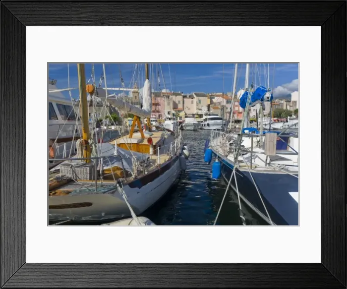 Framed Print : Corsica. France. Europe. Boats in marina at St. Florent