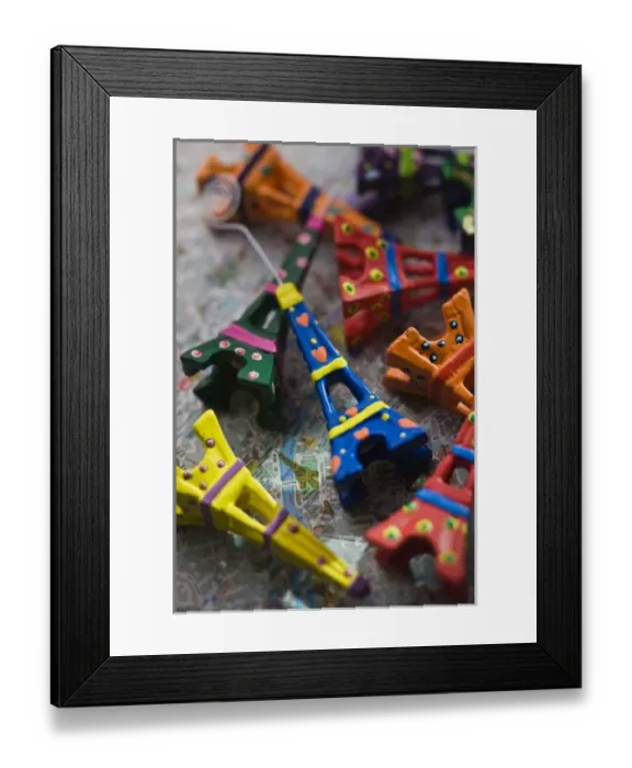 Framed Print : France, Paris, Miniature Eiffel Towers on map of Paris Framed Print : France, Paris, Miniature Eiffel Towers on map of Paris
