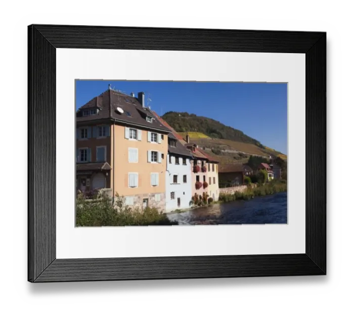 Framed Print : France, Haut-Rhin, Alsace Region, Alsatian Wine Route, Thann, buildings along Thur River Framed Print : France, Haut-Rhin, Alsace Region, Alsatian Wine Route, Thann, buildings along Thur River