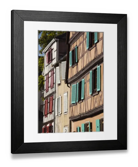 Framed Print : France, Haut-Rhin, Alsace Region, Alsatian Wine Route, Thann, buildings along Thur River