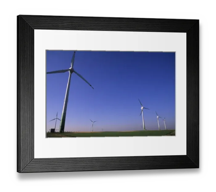 Framed Print : Life in Germany ecology with wind mills capturing wind energy for electricity near Framed Print : Life in Germany ecology with wind mills capturing wind energy for electricity near