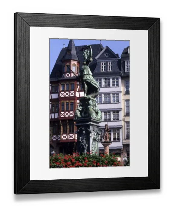 Framed Print : Life in Germany in Frankfurt the famous Romerberg Square statue of justice in old Framed Print : Life in Germany in Frankfurt the famous Romerberg Square statue of justice in old