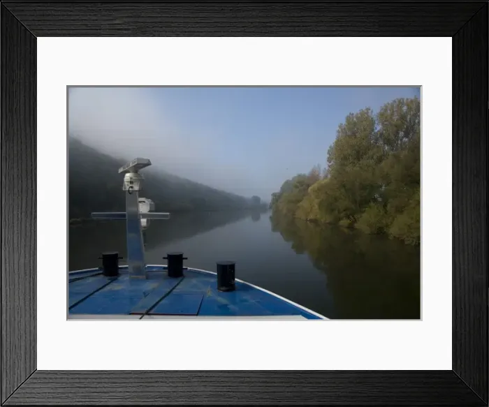 Framed Print : Germany, Franconia. Cruising along the Main River near Wertheim with early morning fog