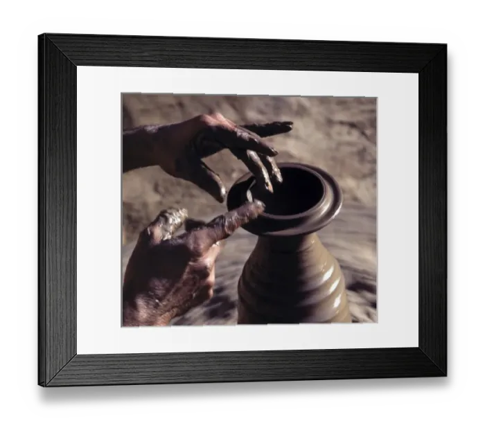 Framed Print : India, Kashmir, Srinagar. A potters skilled hands shape a new pot in Srinagar, Kashmir, India