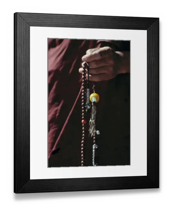 Framed Print : Sikkim, Gangtok. A monk holds graceful prayer beads at Rumtek Monastery, Gangtok, Sikkim