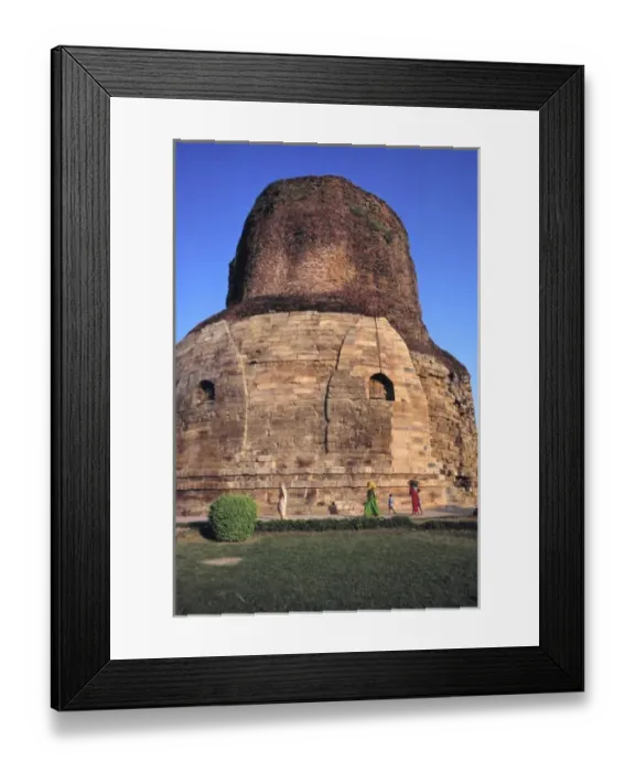 Framed Print : Asia, India, Sarnath. Diminished figures walk in front of the pink-stoned Dhamekh Stupa Framed Print : Asia, India, Sarnath. Diminished figures walk in front of the pink-stoned Dhamekh Stupa