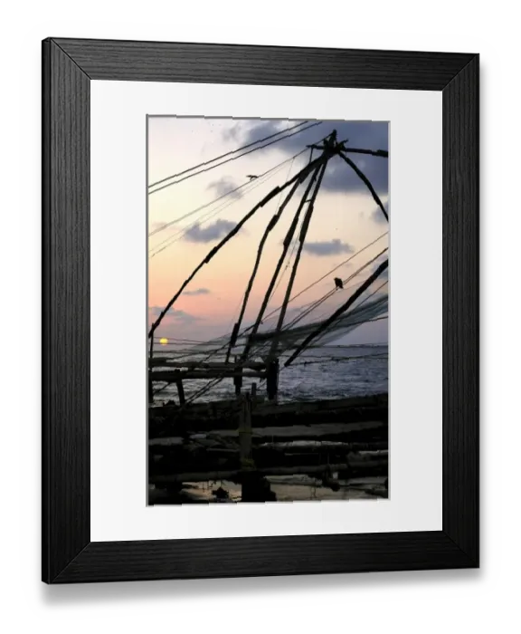Framed Print : Asia, India, Kerala, Kochi (Cochin). A silhouette of a Chinese fishing net Framed Print : Asia, India, Kerala, Kochi (Cochin). A silhouette of a Chinese fishing net