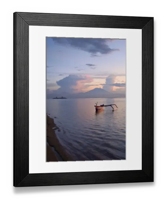 Framed Print : Indonesia, Bali. Sunrise on fishing boat and Sanur Beach with Mount Gunung Agung in distance