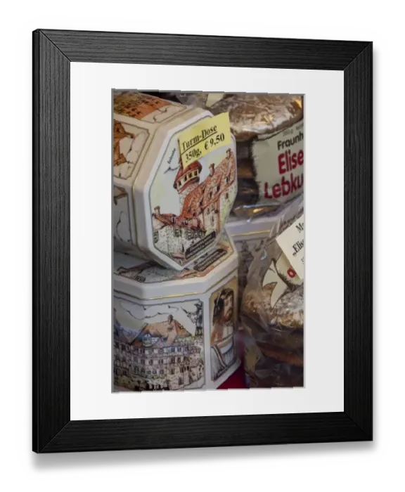 Framed Print : Germany, Bavaria, Nuremberg. German cookie sanck tins with Imperial Castle (aka Kaiserburg)