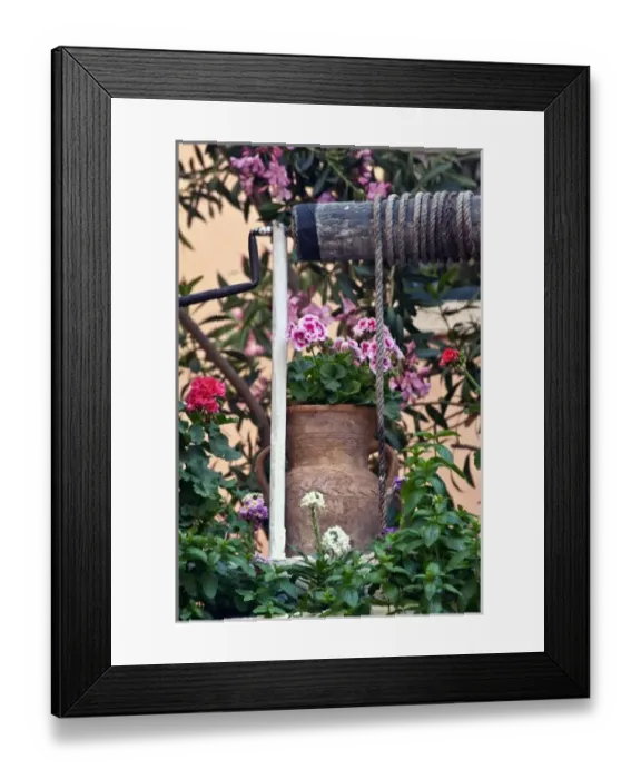 Framed Print : Winch and flowers, Chania, Crete, Greece