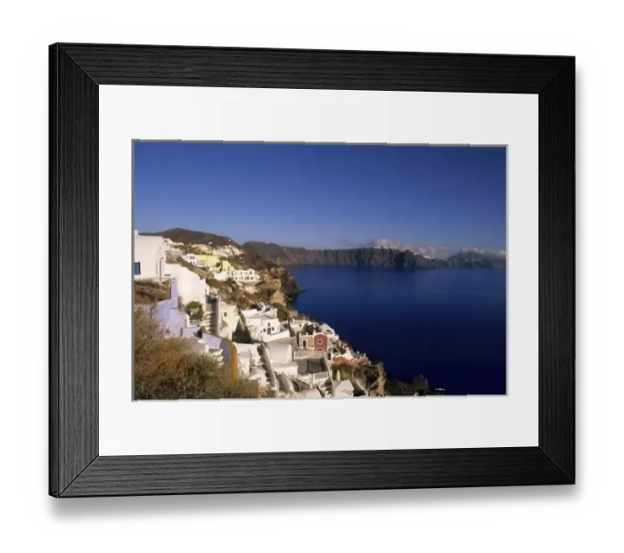 Framed Print : The beautiful white buildings on the cliffs in Oia of santorini Greece Framed Print : The beautiful white buildings on the cliffs in Oia of santorini Greece