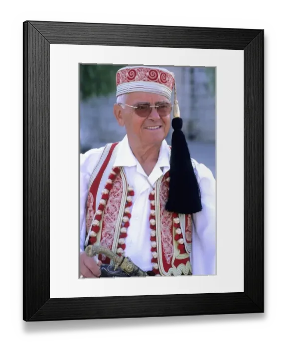 Framed Print : Local man in costume traditional dress in Athens Greece (MR) Framed Print : Local man in costume traditional dress in Athens Greece (MR)