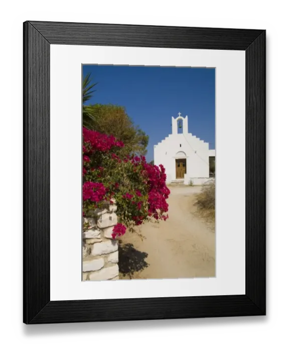 Framed Print : Naoussa, Paros Island, Greece, Europe. White church next to the beautiful flowers Framed Print : Naoussa, Paros Island, Greece, Europe. White church next to the beautiful flowers