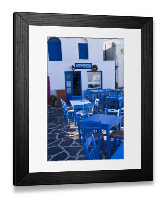 Framed Print : Blue tables and chairs at a restaurant on the Cyclades Islands, Paros Framed Print : Blue tables and chairs at a restaurant on the Cyclades Islands, Paros