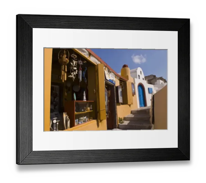 Framed Print : Beautiful village walkway with shops in Oia, Santorini, Greece Framed Print : Beautiful village walkway with shops in Oia, Santorini, Greece