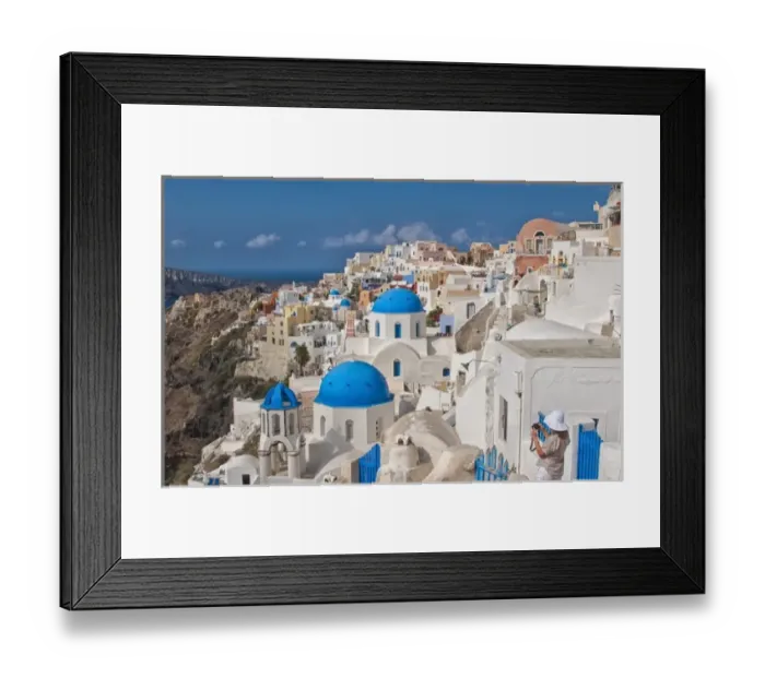Framed Print : Looking down the steep cliffs of white buildings in beautiful Oia in Santorini in Framed Print : Looking down the steep cliffs of white buildings in beautiful Oia in Santorini in